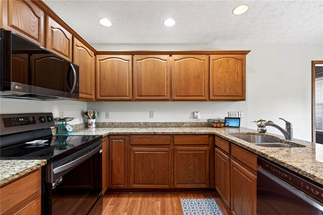 4996 Shannon Avenue Springfield, OH 45504 - Photo 28 of 61 This spacious kitchen offers ample storage and a seamless cooking experience.