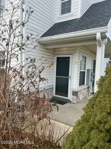 a front view of a house with yard