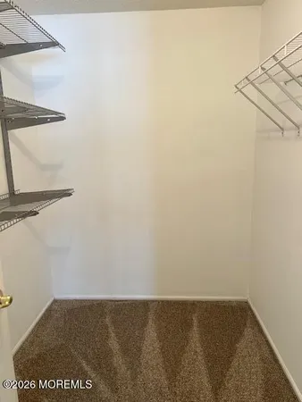 a view of a livingroom with furniture