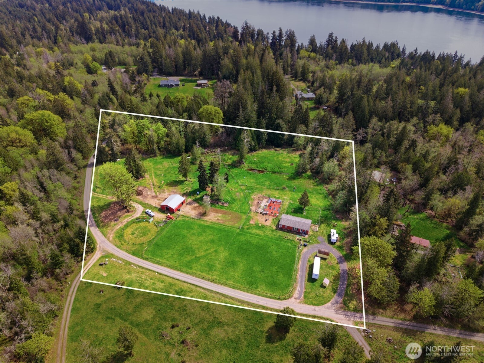 291 East Orchid Lane Grapeview, WA 98546 - Photo 32 of 37 a view of a tennis court