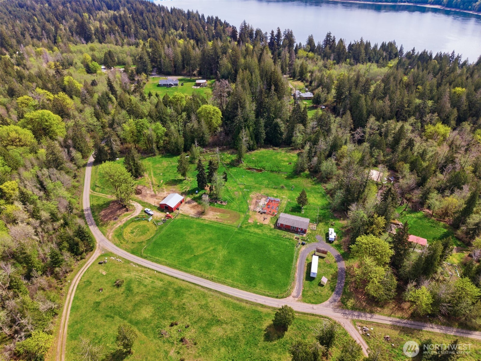 291 East Orchid Lane Grapeview, WA 98546 - Photo 33 of 37 a view of a golf course with a tree