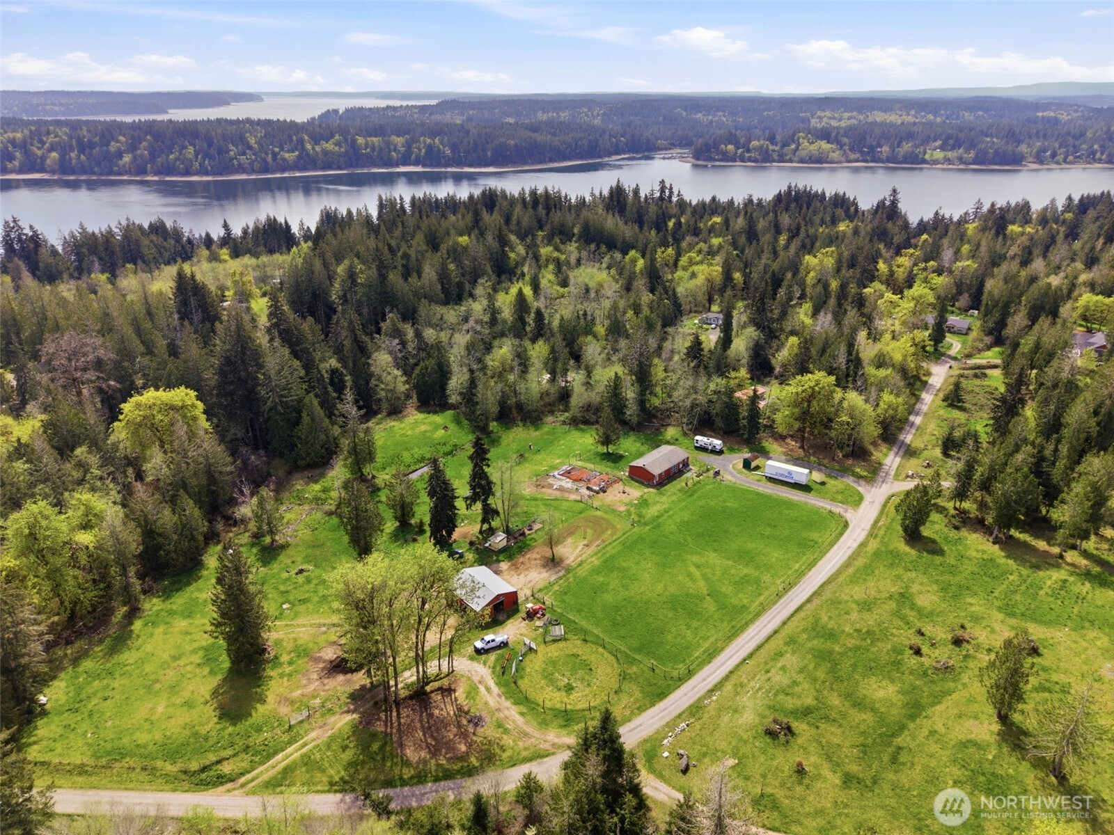 291 East Orchid Lane Grapeview, WA 98546 - Photo 35 of 37 a view of a lush green field