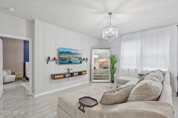 a living room with furniture and a couch