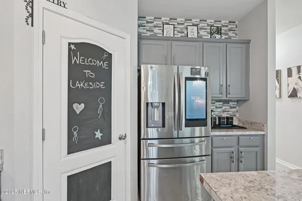 a view of a swimming pool with a lake view