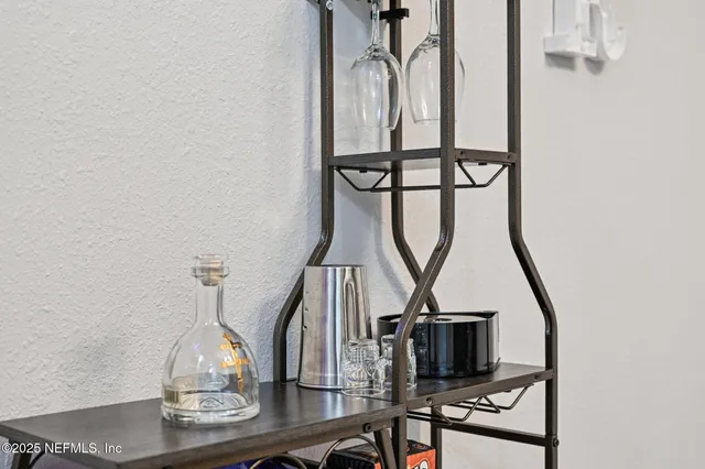 a kitchen with stainless steel appliances granite countertop a refrigerator and a stove