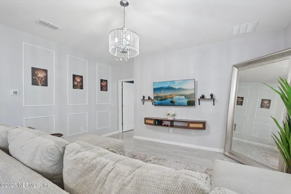 a picture of a bathroom with mirror