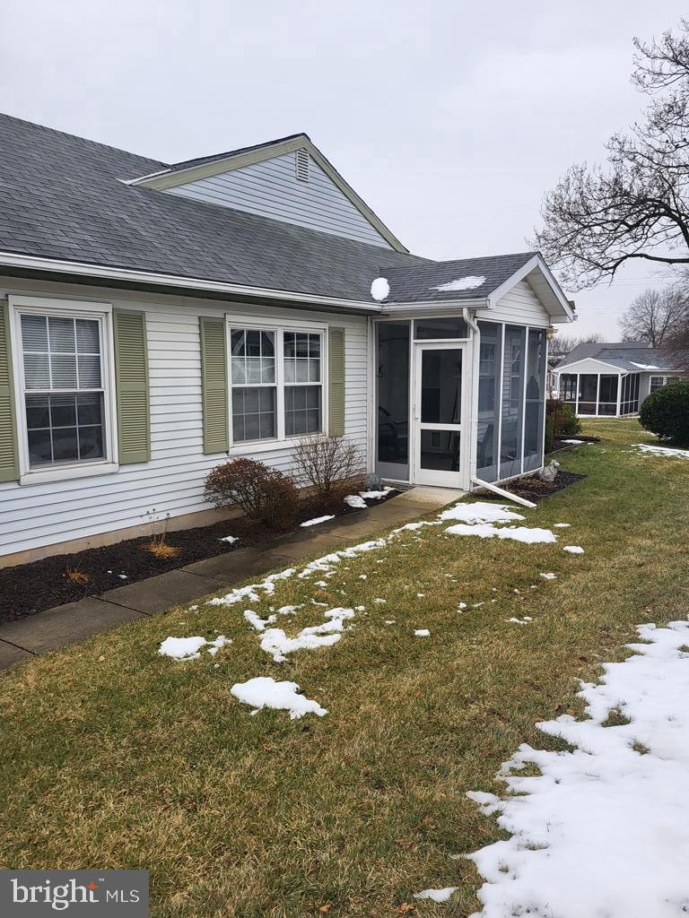 7025 Arbor Drive Frederick, MD 21703 - Photo 2 of 4 a front view of a house with a yard