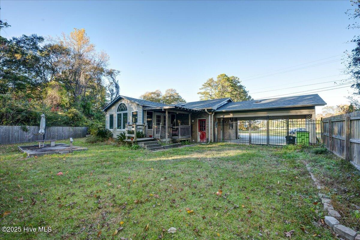 707 Clermont Road New Bern, NC 28560 - Photo 31 of 34 Large fenced backyard with storage shed