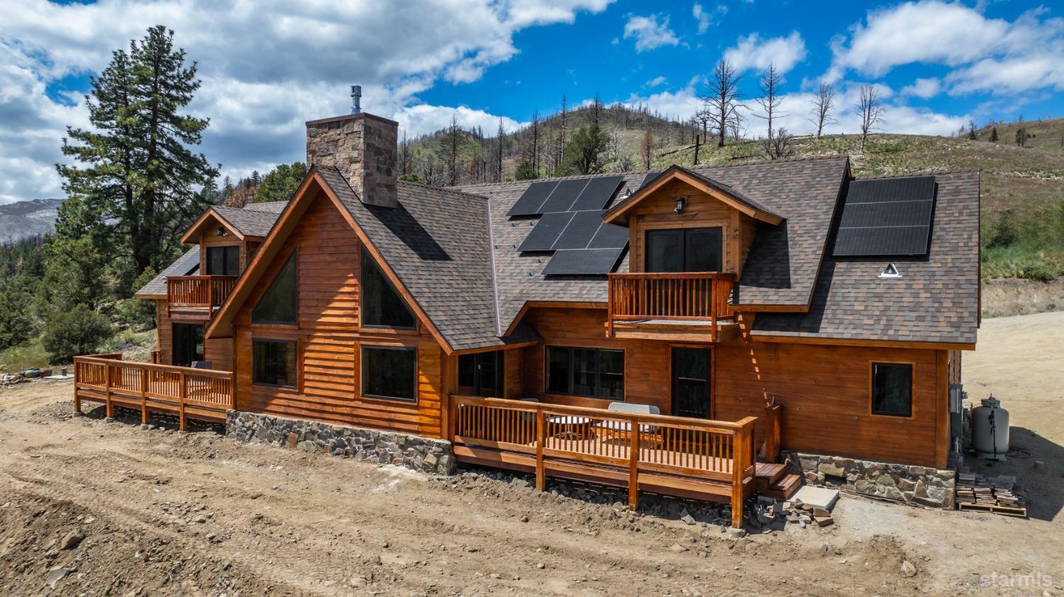 151 Silver Peak Road Markleeville, CA 96120 - Photo 28 of 33 Front view of house showing the solar panels