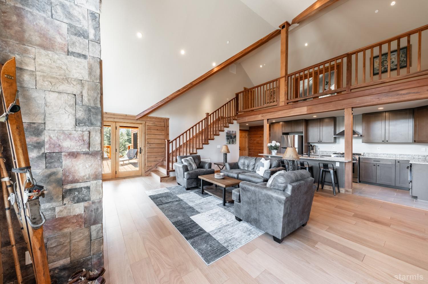 151 Silver Peak Road Markleeville, CA 96120 - Photo 5 of 33 Great room showing beautiful staircase made from imported Tiger wood