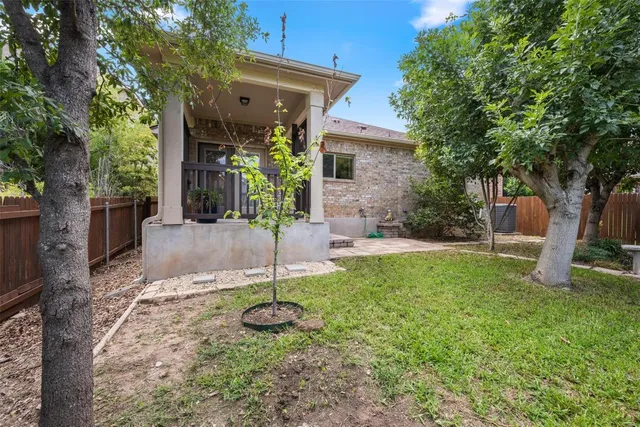 a view of a backyard with a trees
