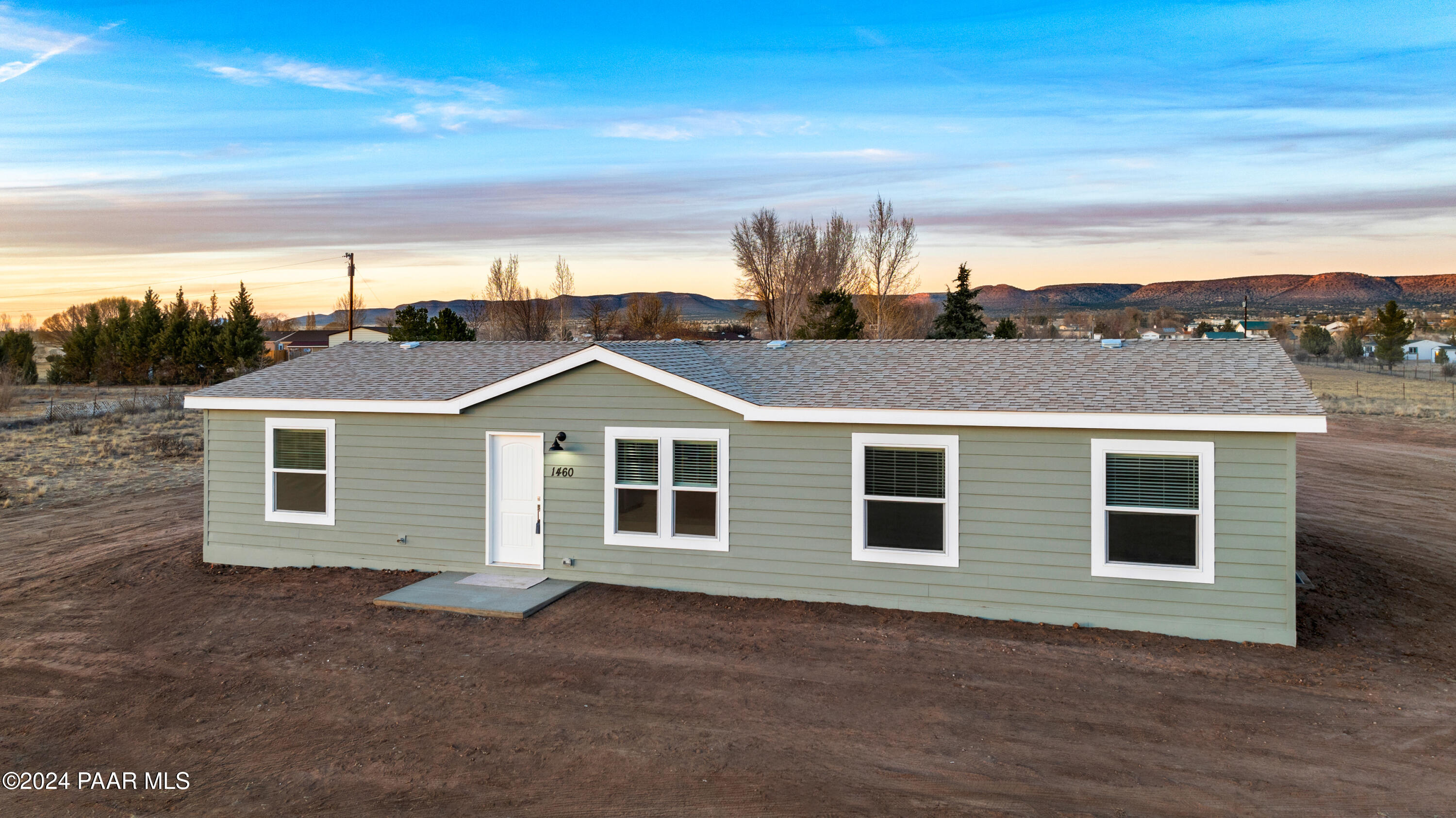 1460 Saddle Road Paulden, AZ 86334 - Photo 26 of 27 a view of a house with a backyard