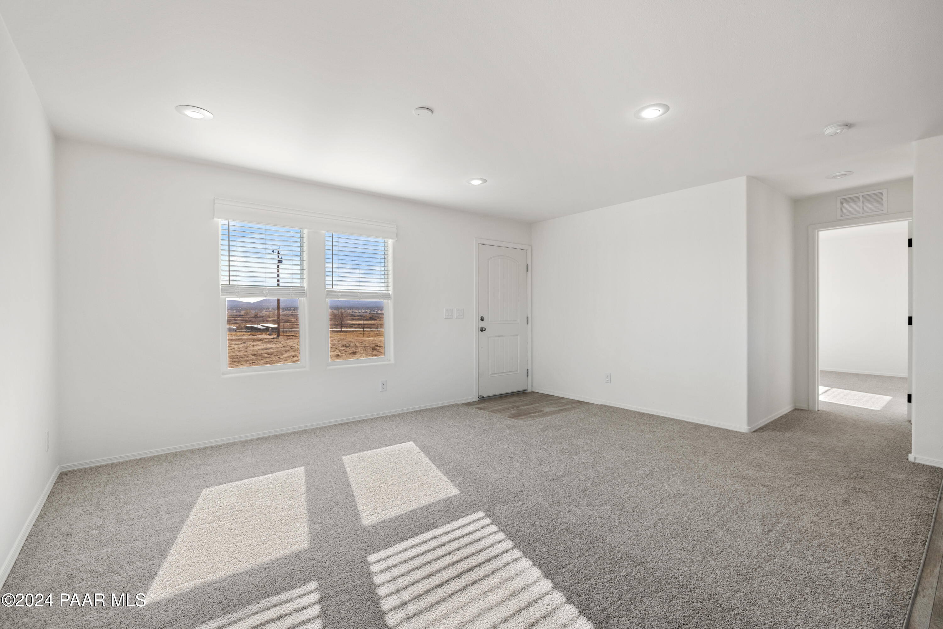 1460 Saddle Road Paulden, AZ 86334 - Photo 10 of 27 a view of an empty room with a window