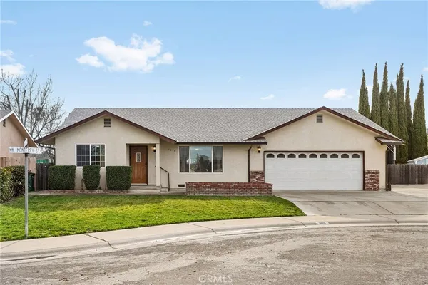 a view of front of house with a yard