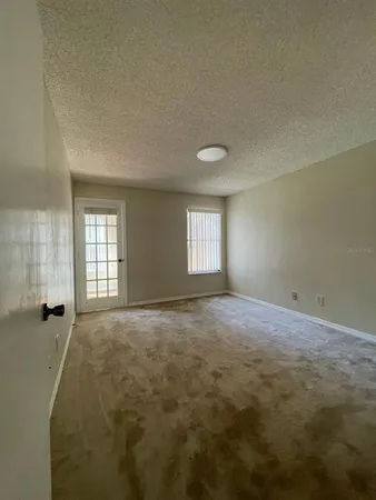 an empty room with windows