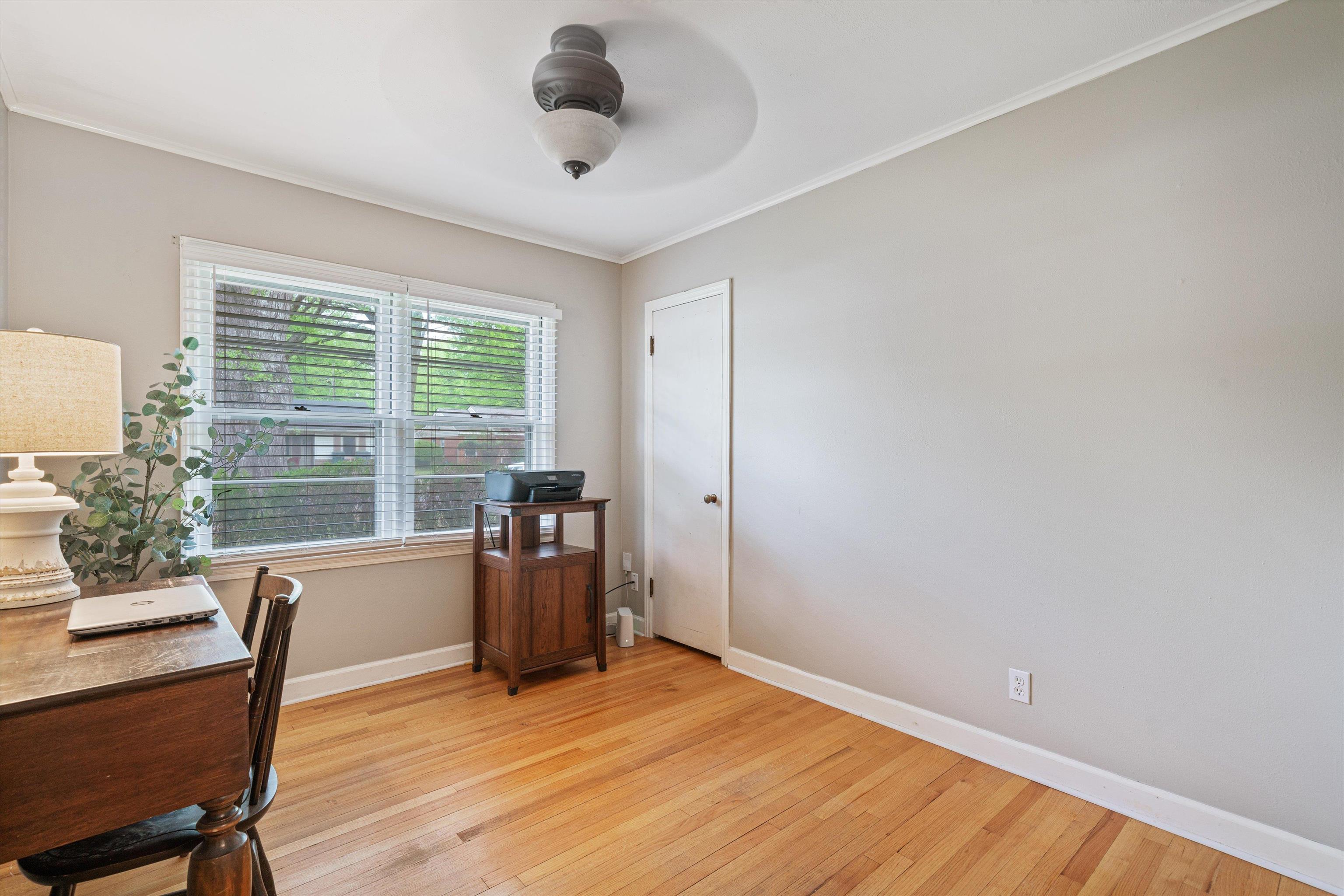 1194 West Perkins Road Memphis, TN 38117 - Photo 18 of 23 a view of a workspace with furniture and a window