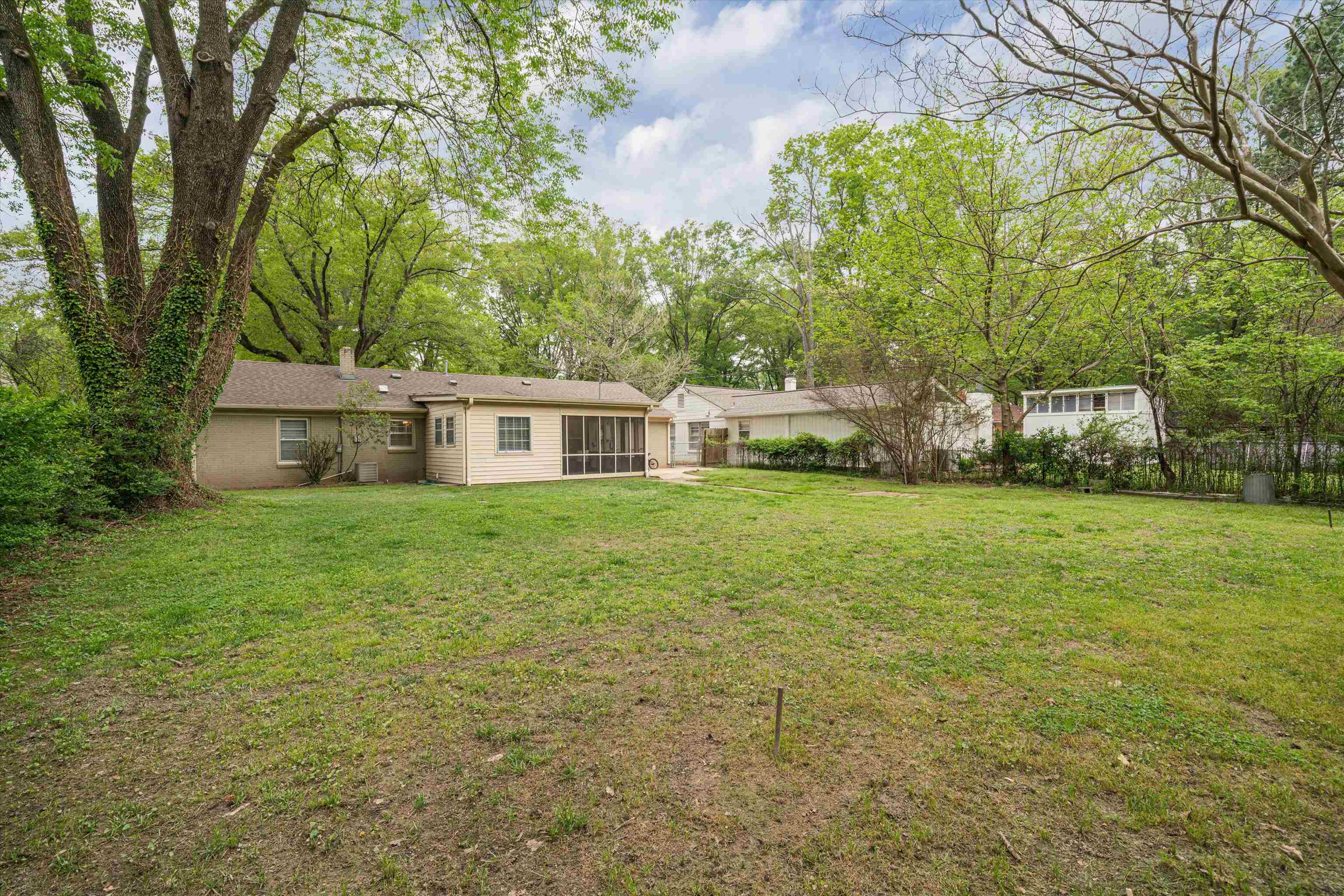 1194 West Perkins Road Memphis, TN 38117 - Photo 22 of 23 a front view of house with yard and green space