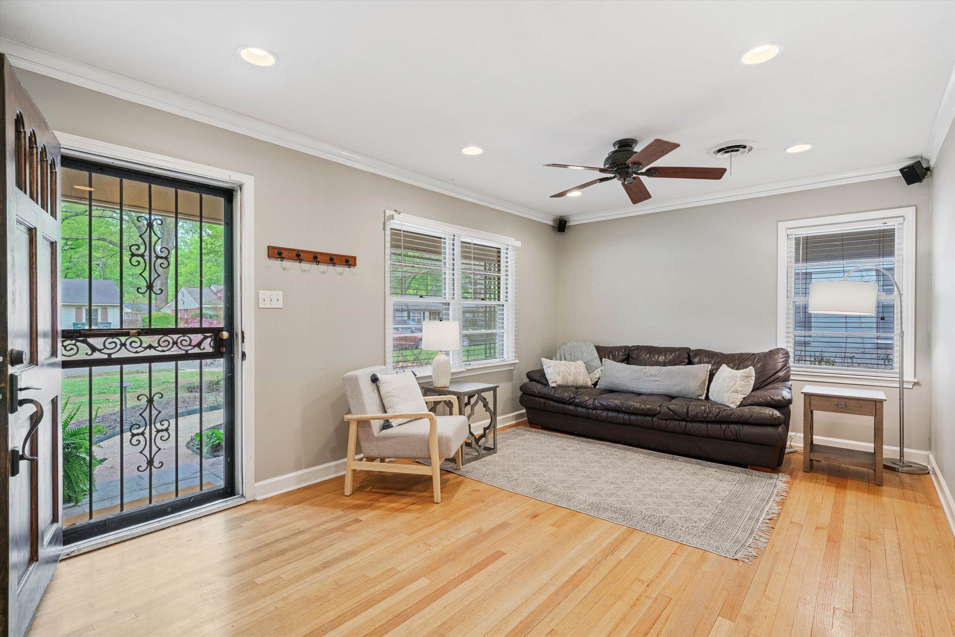 1194 West Perkins Road Memphis, TN 38117 - Photo 5 of 23 a living room with furniture and a wooden floor
