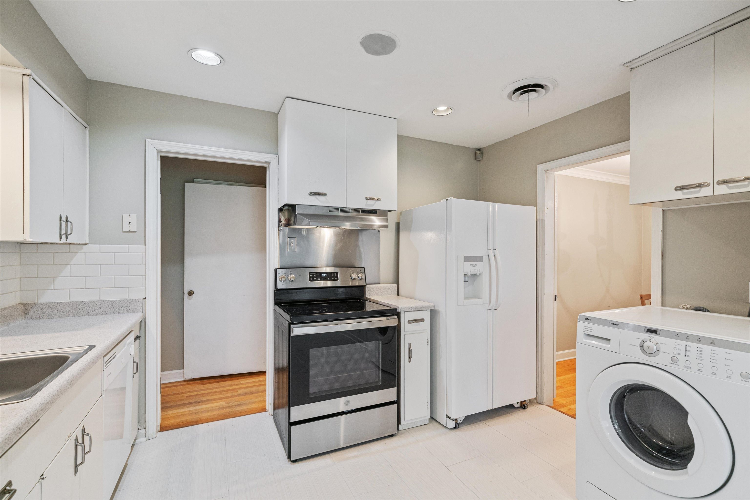 1194 West Perkins Road Memphis, TN 38117 - Photo 9 of 23 a kitchen with stainless steel appliances a refrigerator stove and sink