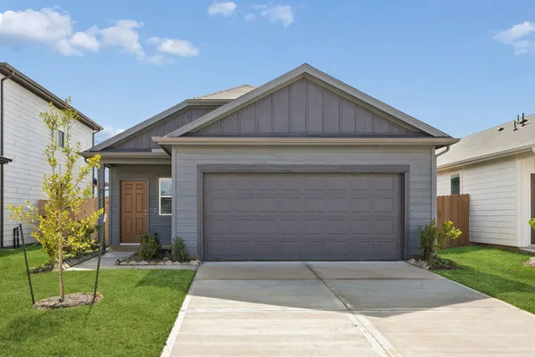 a front view of house with a yard