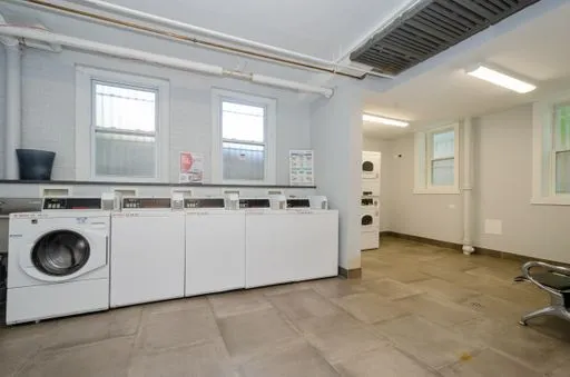 a view of a kitchen with electric appliances
