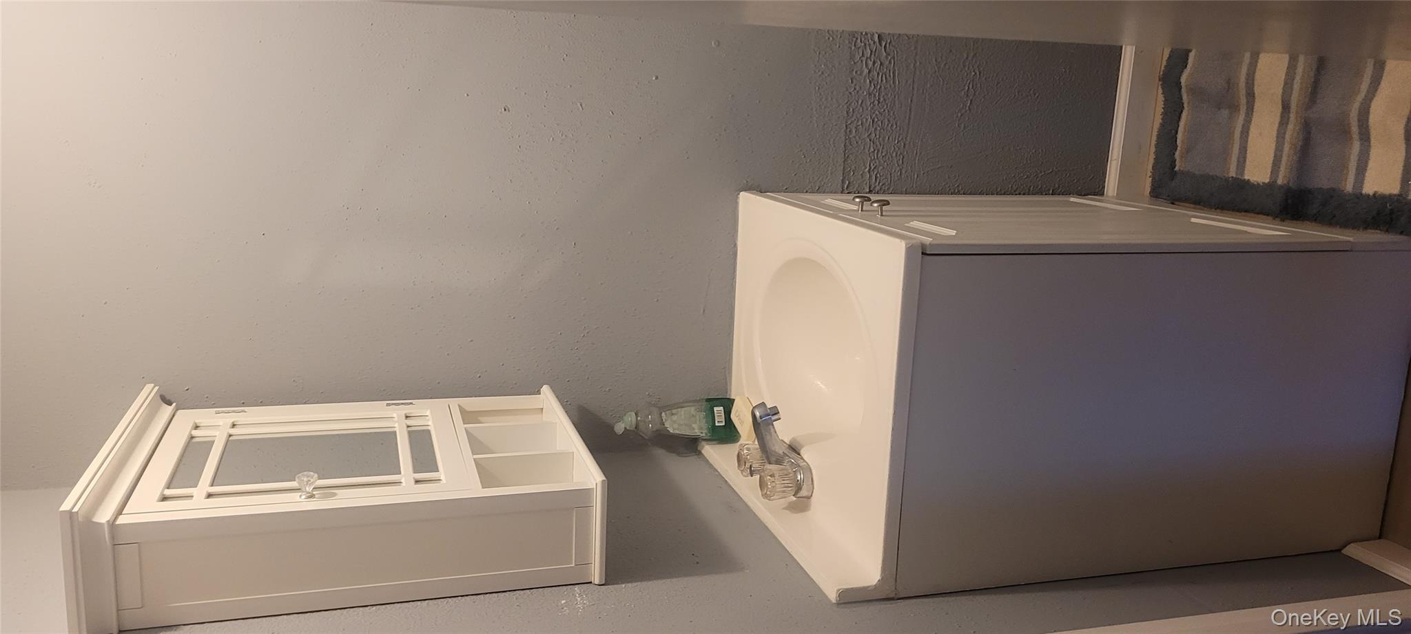 2 Williamsburg Court, Unit C Ridge, NY 11961 - Photo 4 of 20 Bathroom with vanity