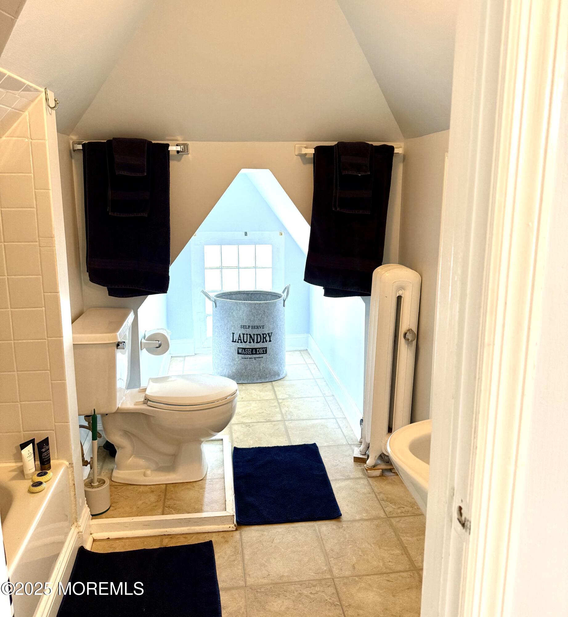 401 2nd Avenue Asbury Park, NJ 07712 - Photo 13 of 13 a bathroom with a toilet and a shower