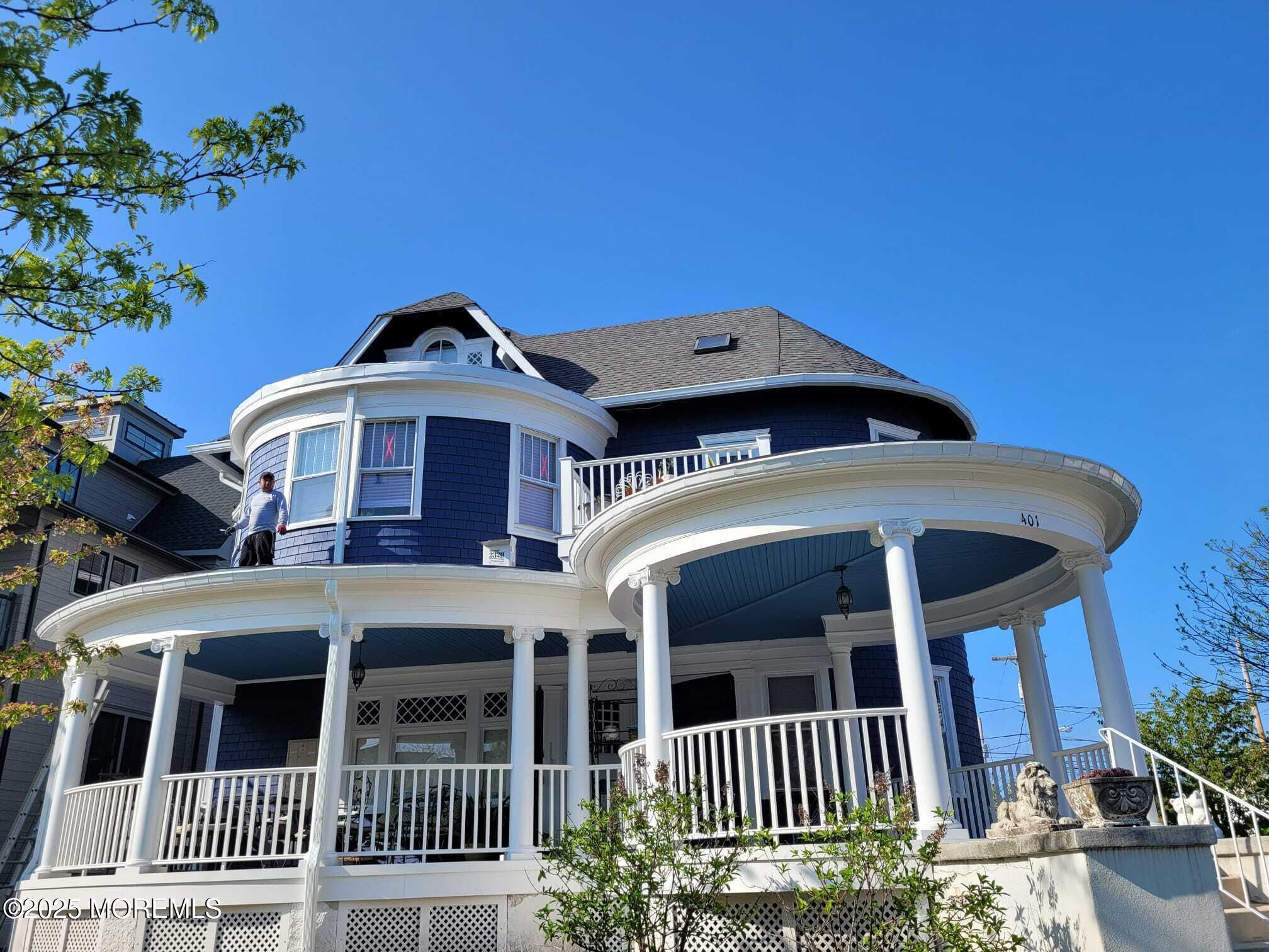 401 2nd Avenue Asbury Park, NJ 07712 - Photo 2 of 13 a front view of a house with a porch