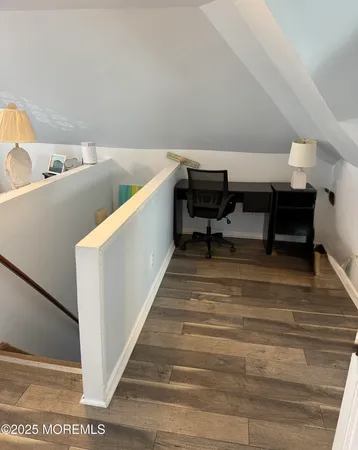 a kitchen with a sink and a stove top oven