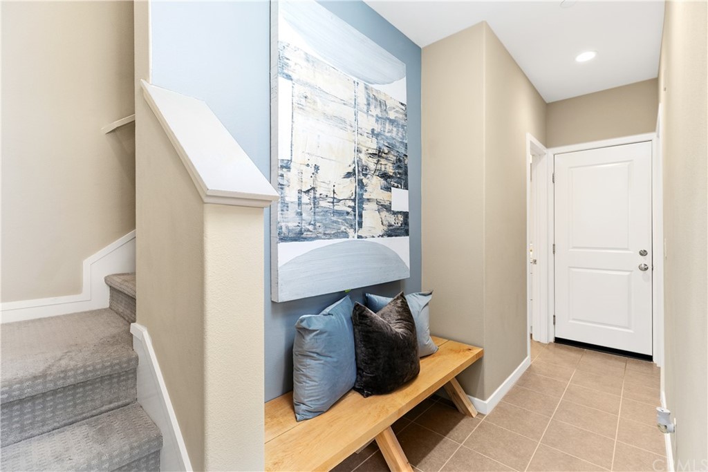 144 Briarberry Irvine, CA 92618 - Photo 4 of 44 a view of entryway and hall with wooden floor