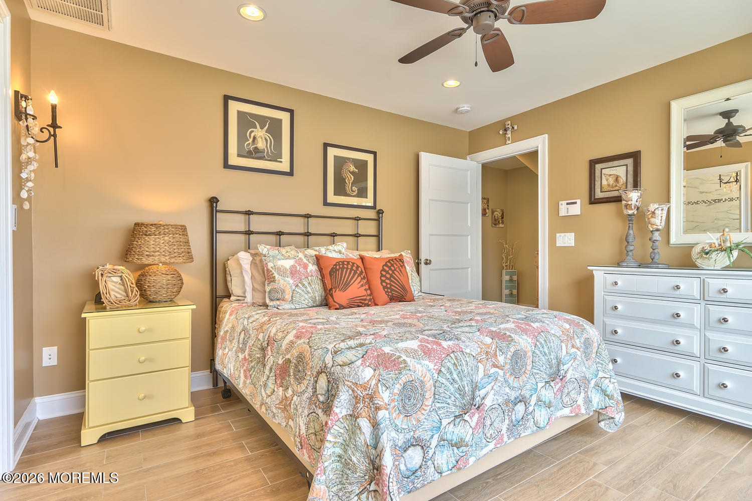 10 4th Avenue, Unit 101 Seaside Heights, NJ 08751 - Photo 13 of 20 a bedroom with a bed and a dresser