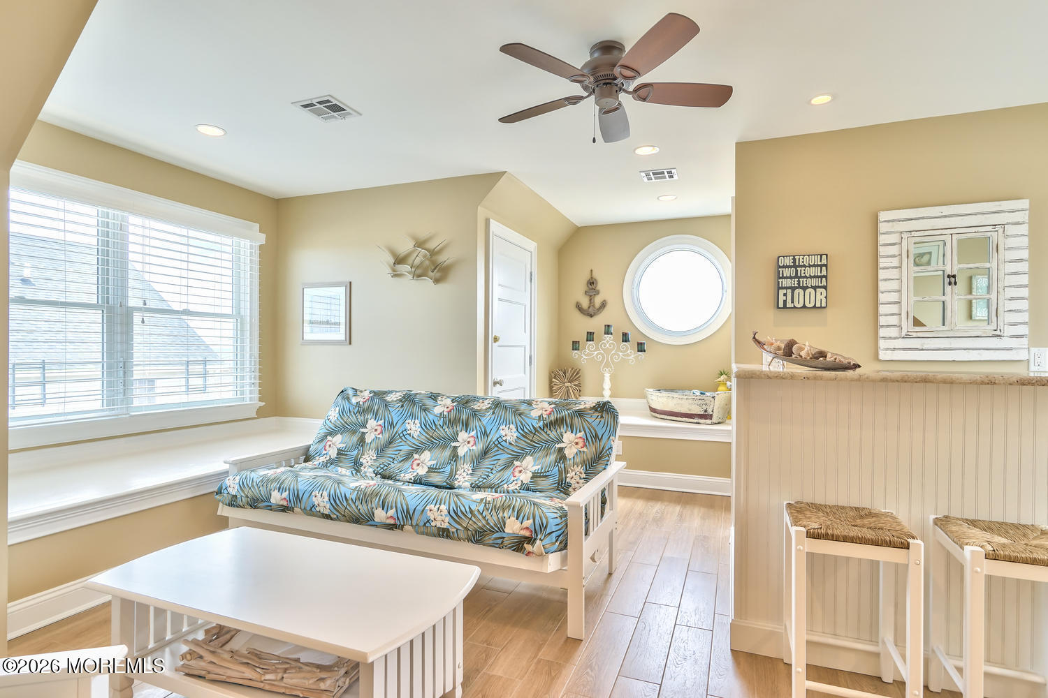 10 4th Avenue, Unit 101 Seaside Heights, NJ 08751 - Photo 17 of 20 a living room with granite countertop furniture a fireplace and a large window