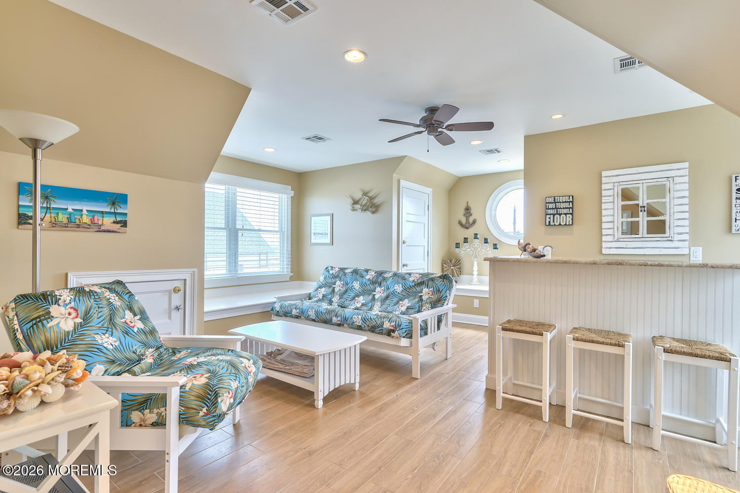 10 4th Avenue, Unit 101 Seaside Heights, NJ 08751 - Photo 18 of 20 a living room with furniture and wooden floor