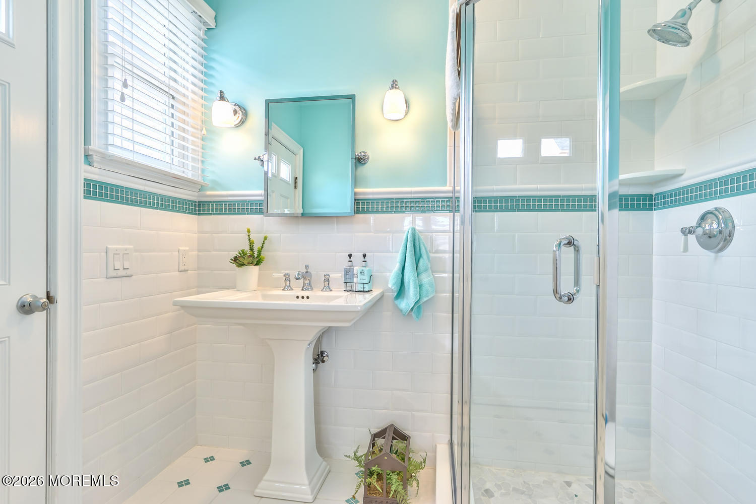 10 4th Avenue, Unit 101 Seaside Heights, NJ 08751 - Photo 19 of 20 a bathroom with a sink shower and a mirror