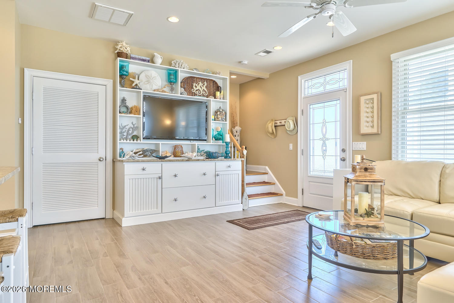10 4th Avenue, Unit 101 Seaside Heights, NJ 08751 - Photo 10 of 20 a living room with furniture and wooden floor