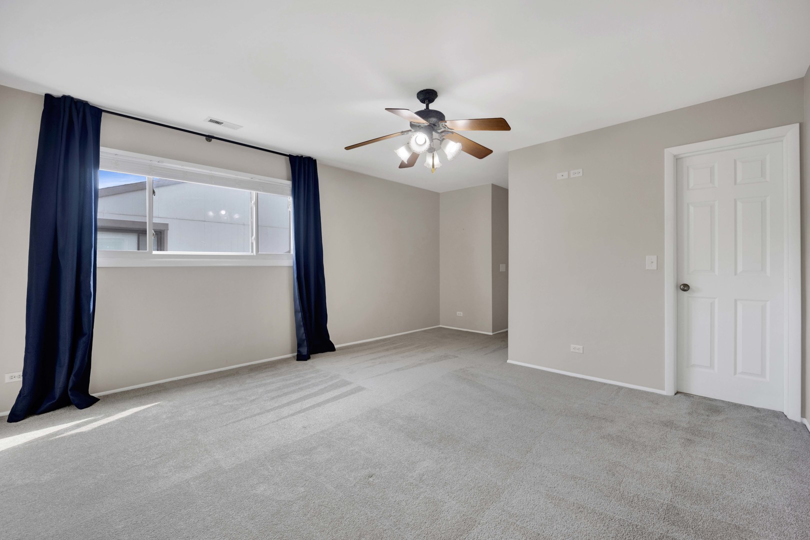 2631 Smith Street Rolling Meadows, IL 60008 - Photo 12 of 24 a view of an empty room with a window