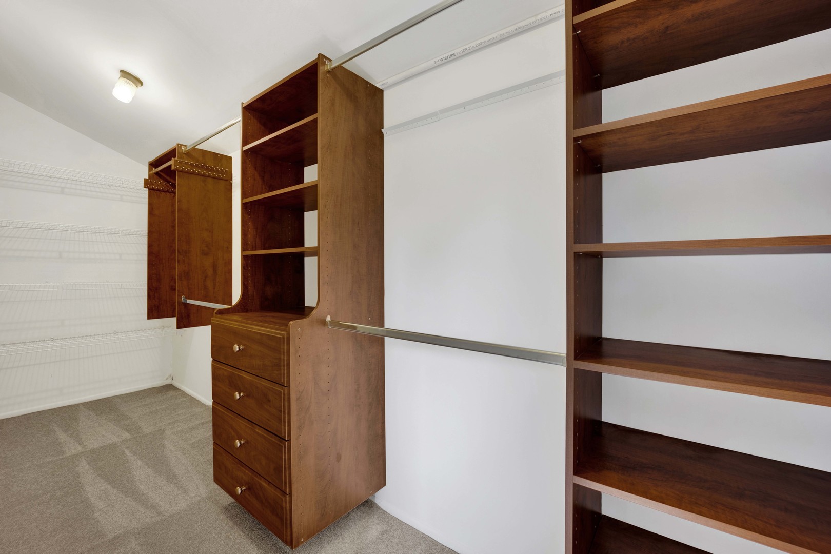 2631 Smith Street Rolling Meadows, IL 60008 - Photo 13 of 24 a view of walk in closet with clothes and shoes