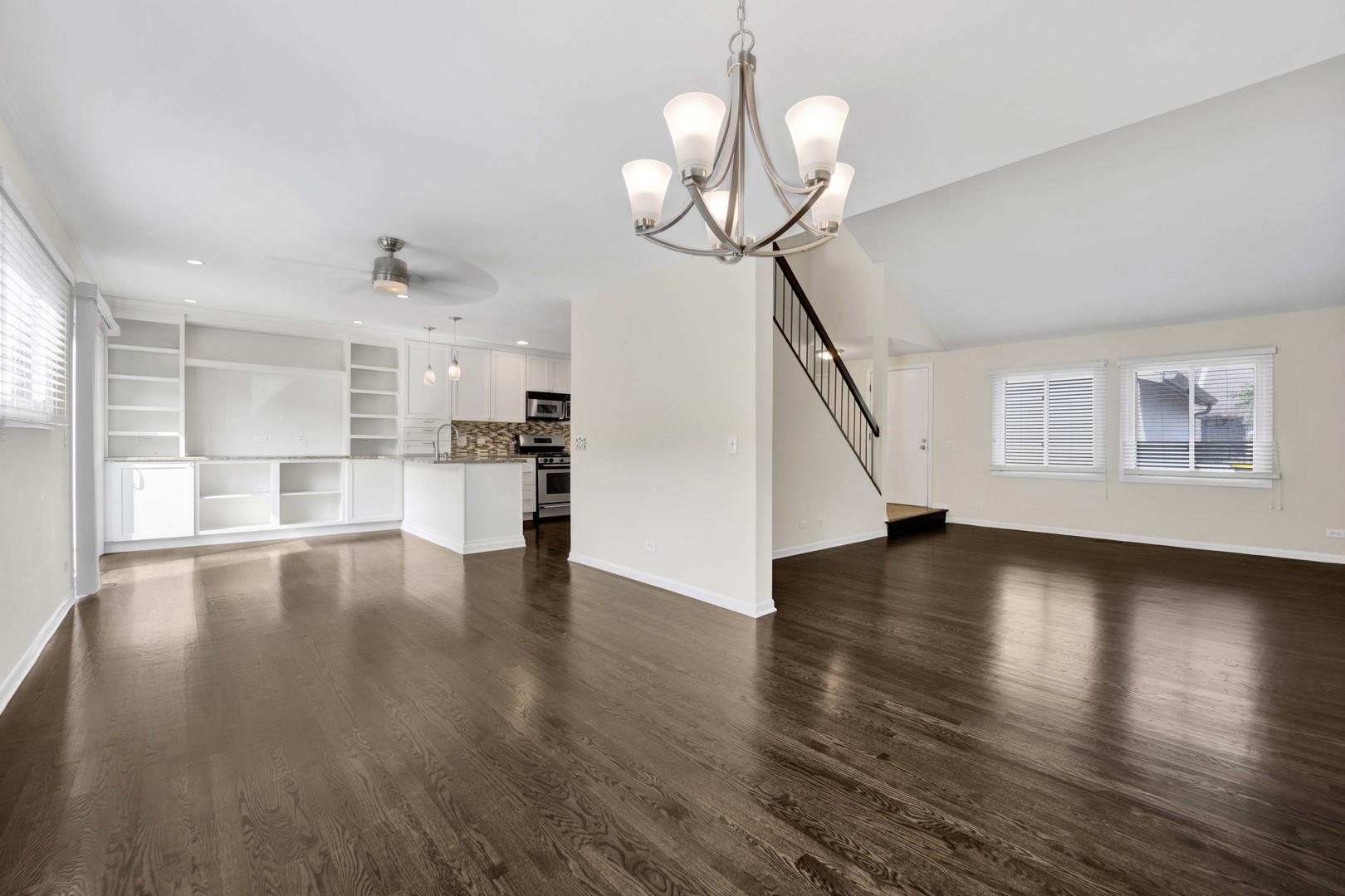 2631 Smith Street Rolling Meadows, IL 60008 - Photo 6 of 24 a view of empty room with wooden floor and window