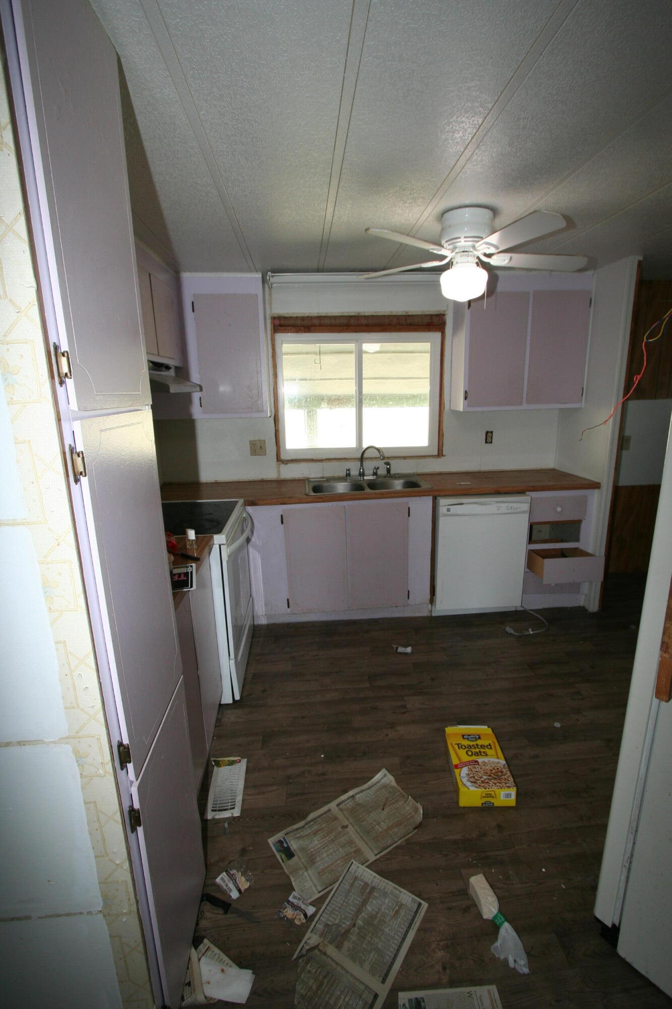 24667 Sprague River Road Sprague River, OR 97639 - Photo 10 of 38 a view of a kitchen with a sink wooden floor and a window