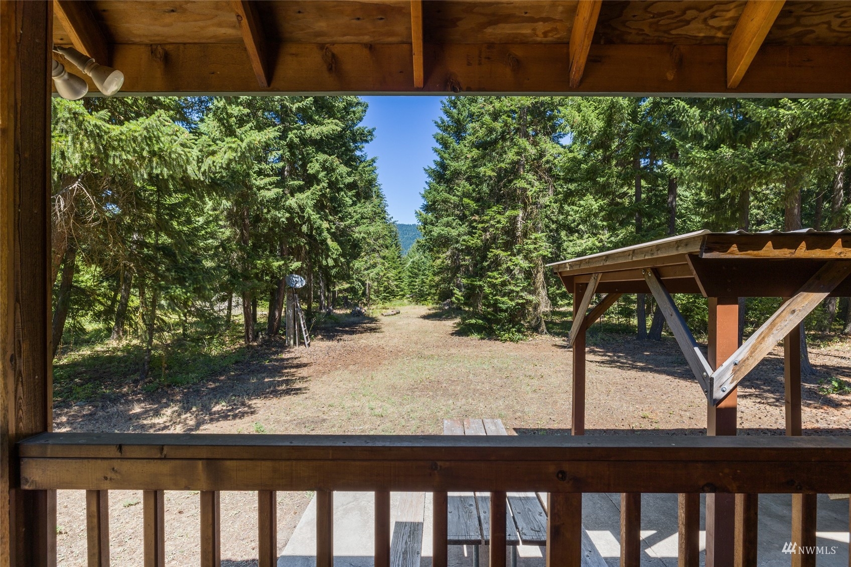 5711 Nelson Siding Road Cle Elum, WA 98922 - Photo 13 of 40 a view of a small yard from a window