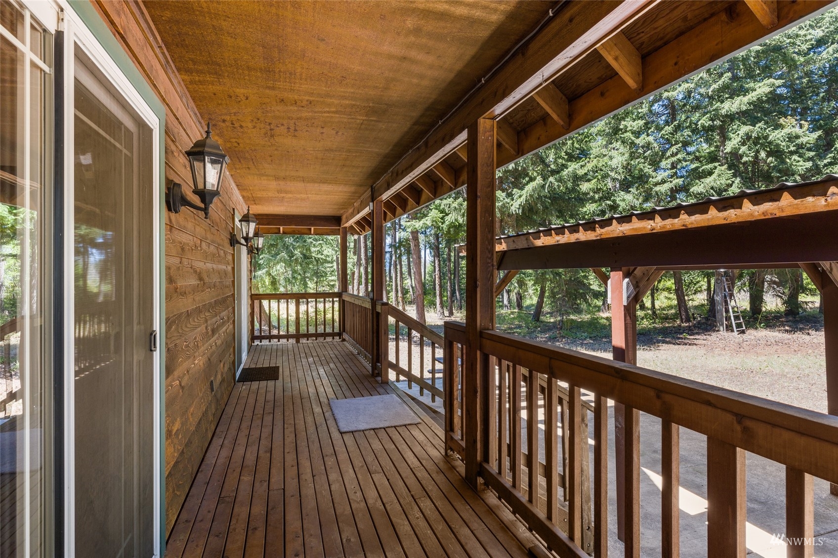 5711 Nelson Siding Road Cle Elum, WA 98922 - Photo 16 of 40 a view of a balcony with wooden floor