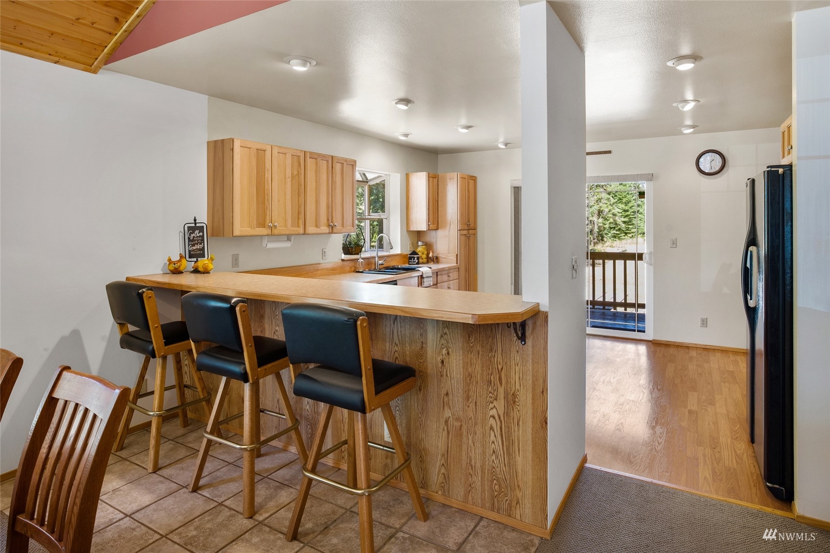 5711 Nelson Siding Road Cle Elum, WA 98922 - Photo 23 of 40 a view of a dining room with furniture window and outside view