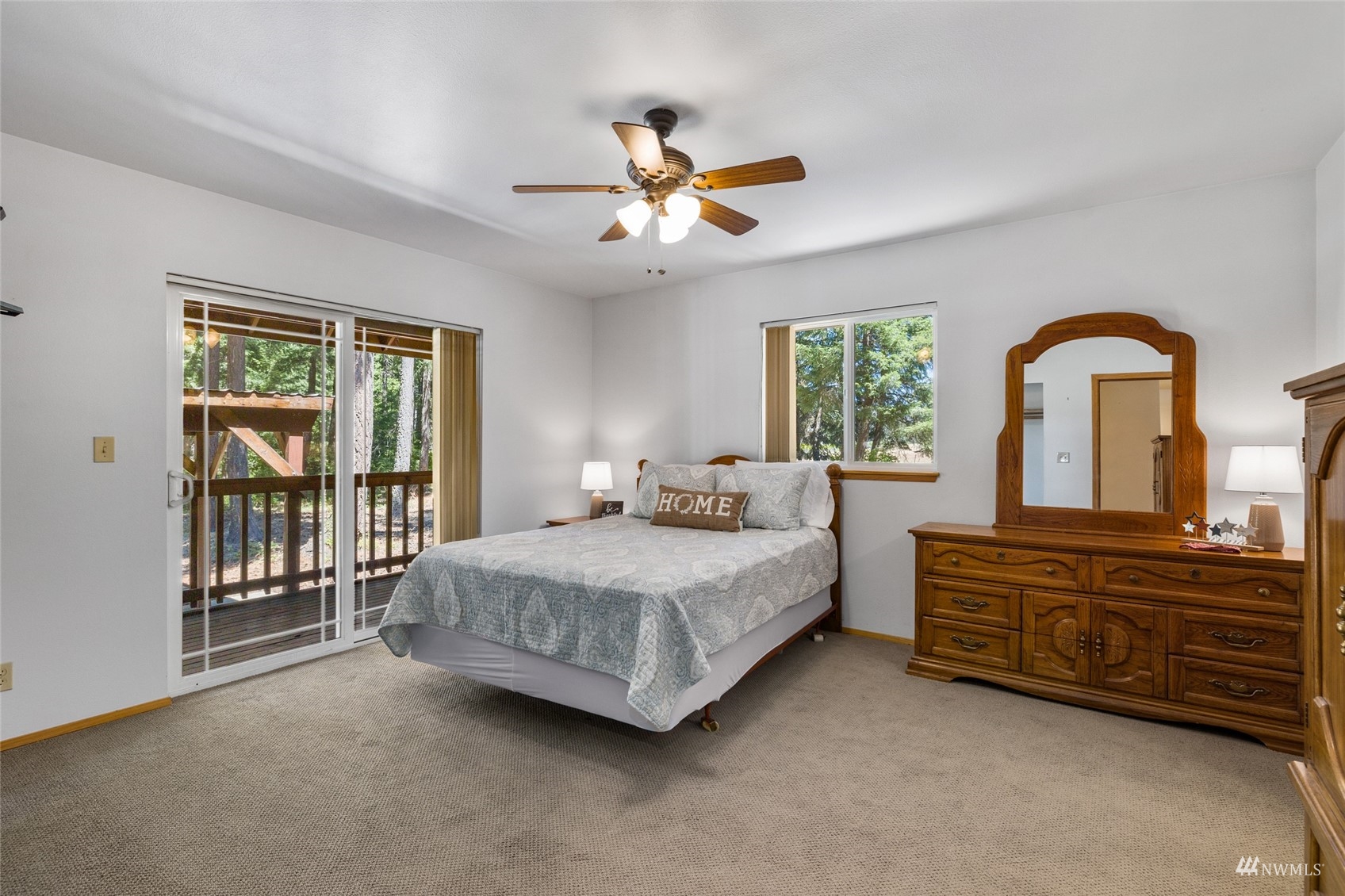 5711 Nelson Siding Road Cle Elum, WA 98922 - Photo 28 of 40 a bedroom with a bed dresser and a large window