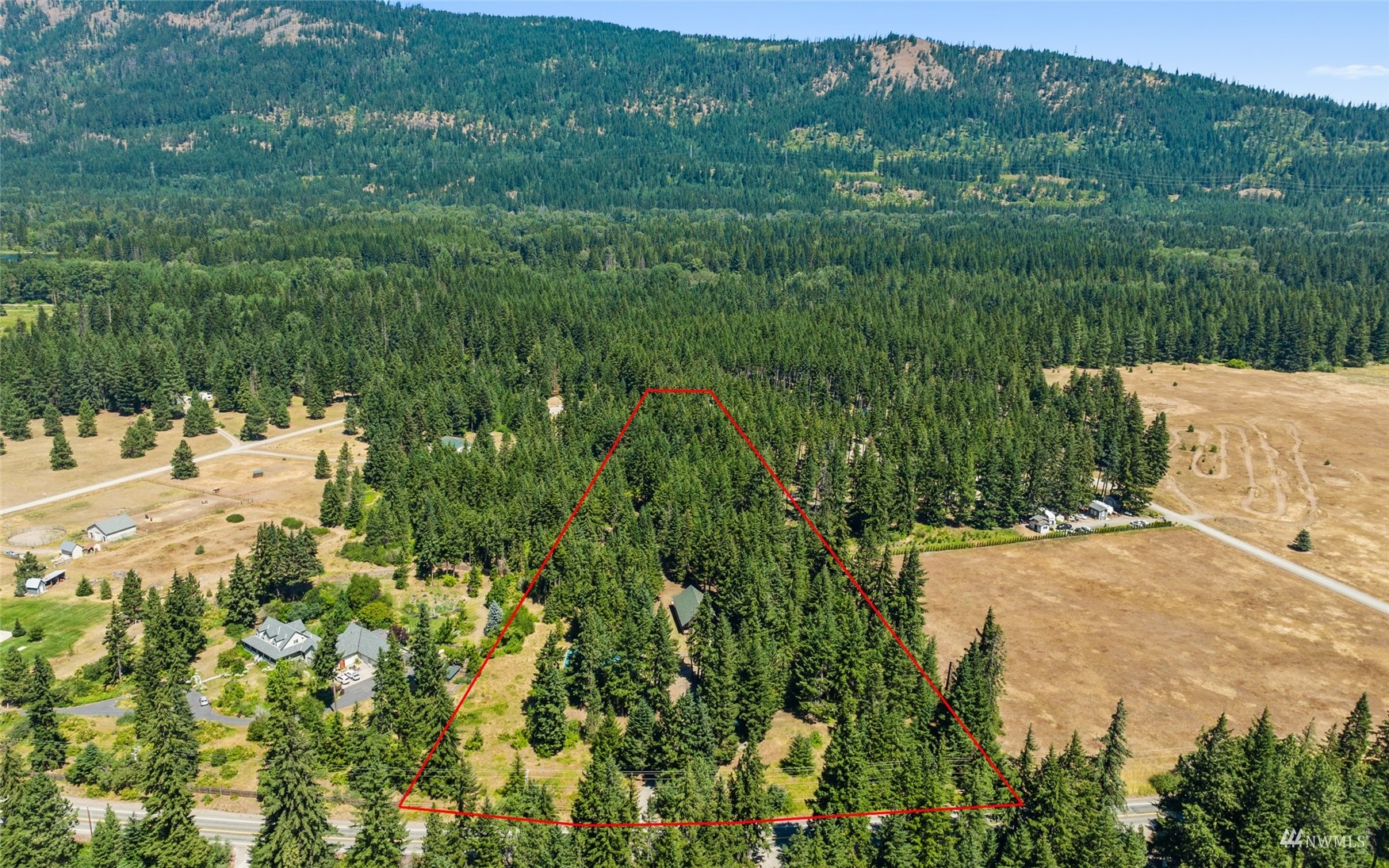 5711 Nelson Siding Road Cle Elum, WA 98922 - Photo 38 of 40 a view of a yard with a sink