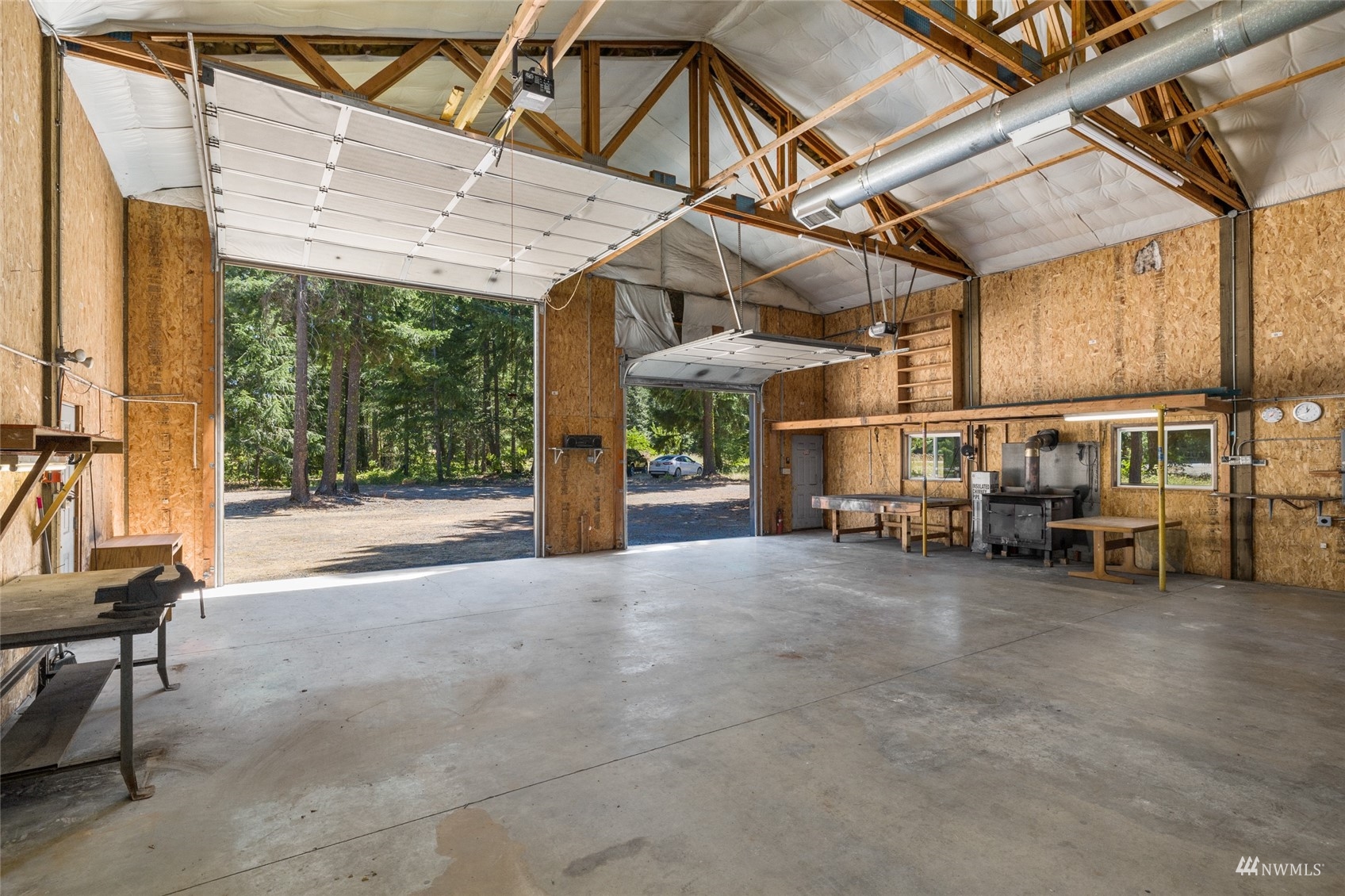 5711 Nelson Siding Road Cle Elum, WA 98922 - Photo 8 of 40 a view of a garage with chairs