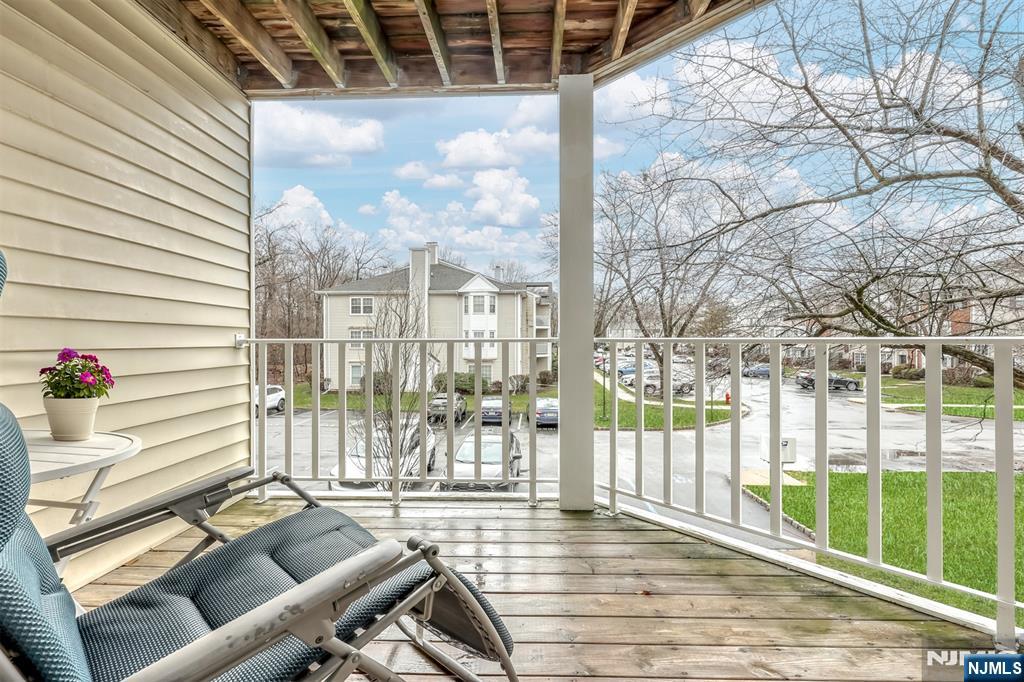 667 Juniper Way, Unit 667 Mahwah, NJ 07430 - Photo 5 of 14 a building outdoor space with patio furniture