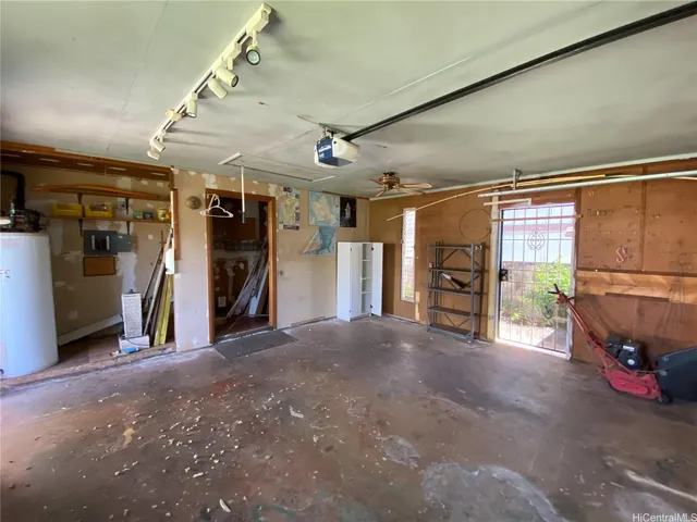 a workspace with furniture window and wooden floor