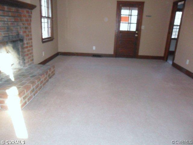 3901 Bronholly Road Chesterfield, VA 23832 - Photo 2 of 6 an empty room with windows