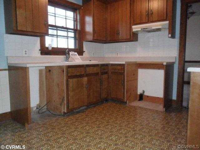 3901 Bronholly Road Chesterfield, VA 23832 - Photo 4 of 6 a kitchen with a sink cabinets and window
