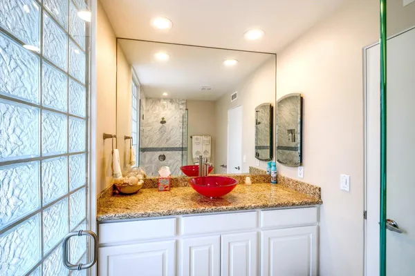 a kitchen with sink and window